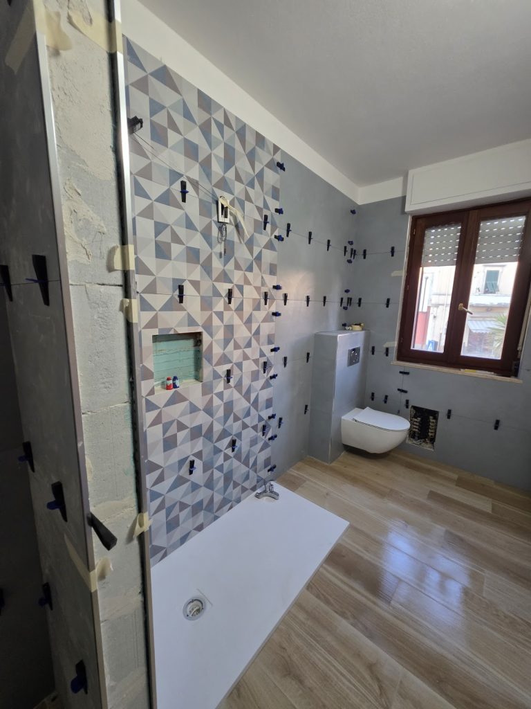 Posa del rivestimento a mosaico